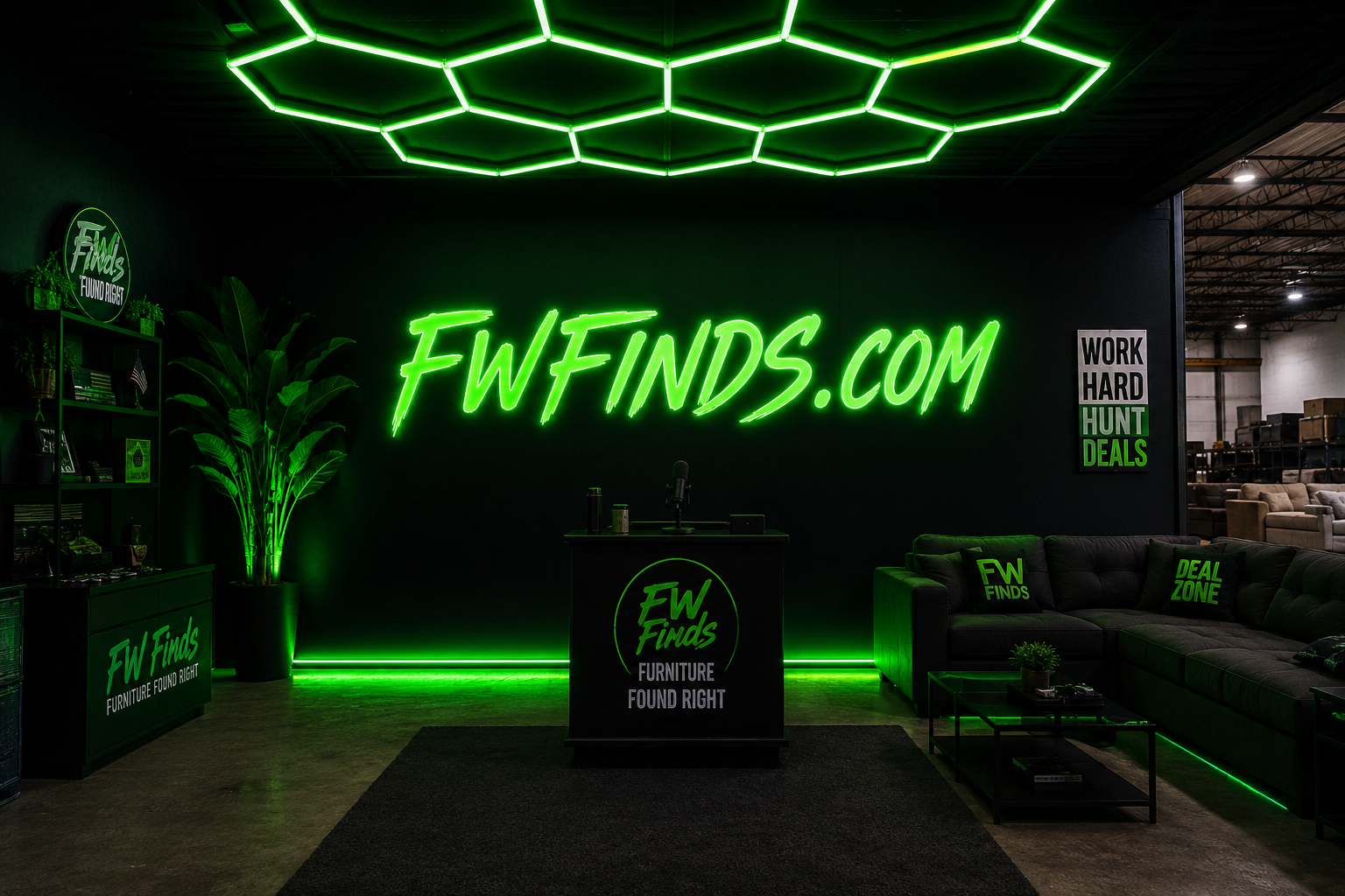 Inside the Fort Wayne Finds warehouse: neon Fort Wayne Finds sign, hex ceiling lights and sectionals in the deal zone